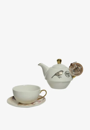 Tea for one: tetera, taza y platillo de porcelana con pájaro y flores